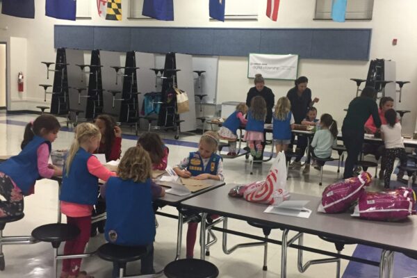 Girls Scouts from Troop #70140 preparing sack lunches for homeless veterans in Northern Virginia and Washington D.C.