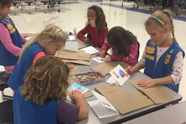 Girls Scouts from Troop #70140 preparing sack lunches for homeless veterans in Northern Virginia and Washington D.C.